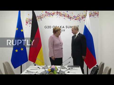 Japan: Putin, Merkel discuss bilateral issues at G20