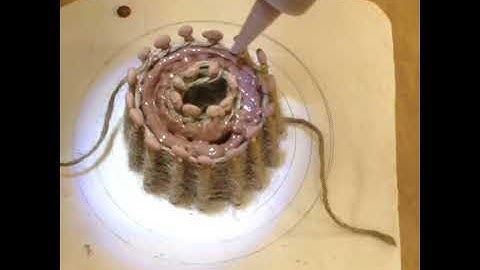 Casting slip hand 3D printing into woven string containment