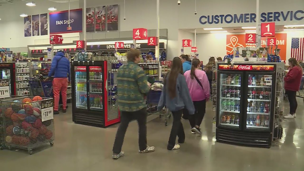 Huge crowds hit the stores for Black Friday - YouTube