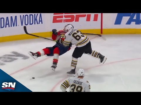 Brad Marchand Knocks Down Matthew Tkachuk With Massive Hit