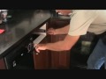 Removing a cabinet drawer with full extension hardware Removing a cabinet drawer with full extension hardware