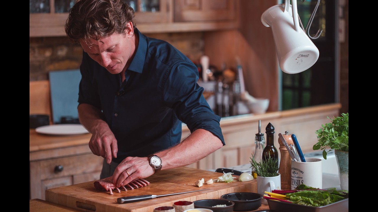 Roasted lamb rack with wilted Swiss chard, hasselback potatoes and ruby port jus