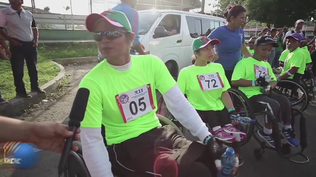 Carrera en silla de ruedas - YouTube