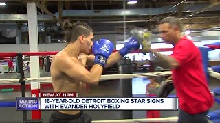 Knocking out the competition, undefeated Detroit boxer signs with Evander Holyfield