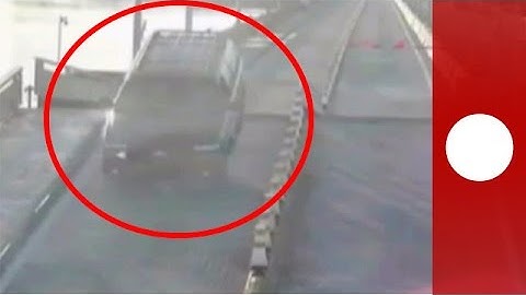 Distracted driver accidently jumps opening drawbridge, Florida