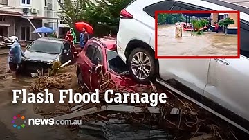 Flash floods leave cars mangled on Indonesian Island