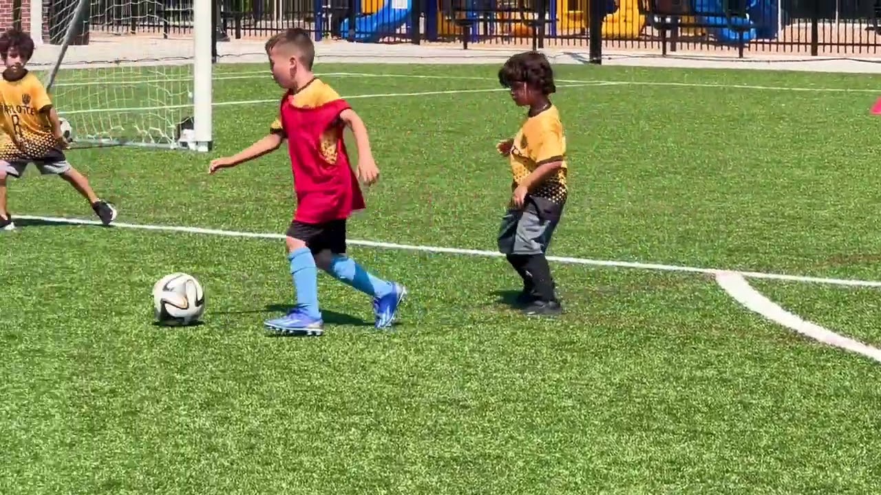 kids soccer ball Playing | Charlotte Rise FC