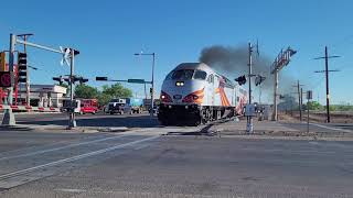 New Mexico Railrunner NMRX 103 departing Bernallio County/Sunport station, smoking it up.