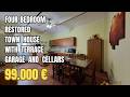 Four-bedroom completely restored town house with terrace, large garage and stone cellars. Palmoli.