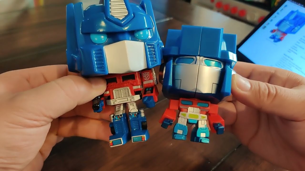 Hasbro Gaming Rubik's Crew Game: Transformers Optimus Prime Edition vs Funko Pop 22 Optimus Prime