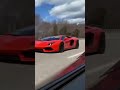 Lamborghini Aventador in all its glory, driving by.