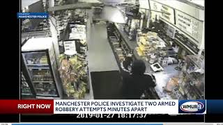 Manchester police investigate 2 armed robberies
