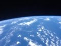 Вид из иллюминатора Международной космической станции на нашу планету