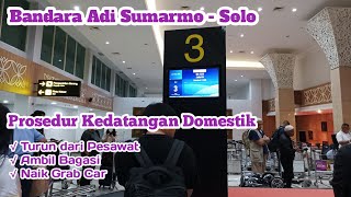 Adi Sumarmo Airport - Prosedur Kedatangan Domestik: turun dari pesawat, ambil bagasi & naik Grab Car