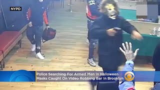 Police: Armed Men In Halloween Masks Caught On Video Robbing Bar In Brooklyn screenshot 2
