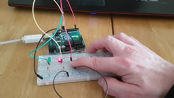 Toggle between 2 led with one push button