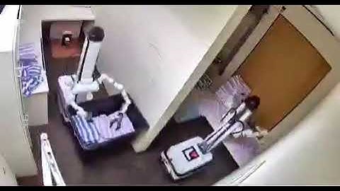Watch as these two robots spend the night shift folding towels. They can do this 247