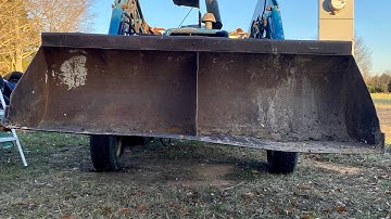 How to Straighten a Bent Tractor Bucket