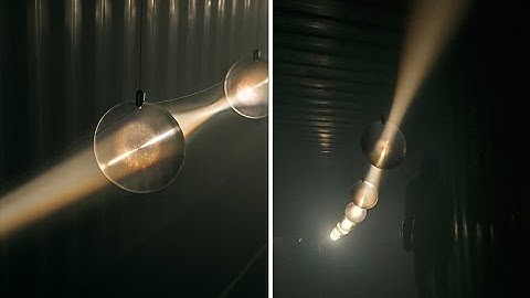 IPOcle warps reality inside a shipping container with layered luminescence