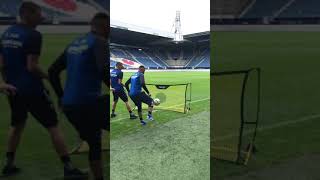 Rebounder finishing drill at the stadium