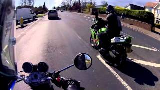 Biker nearly hits oncoming car