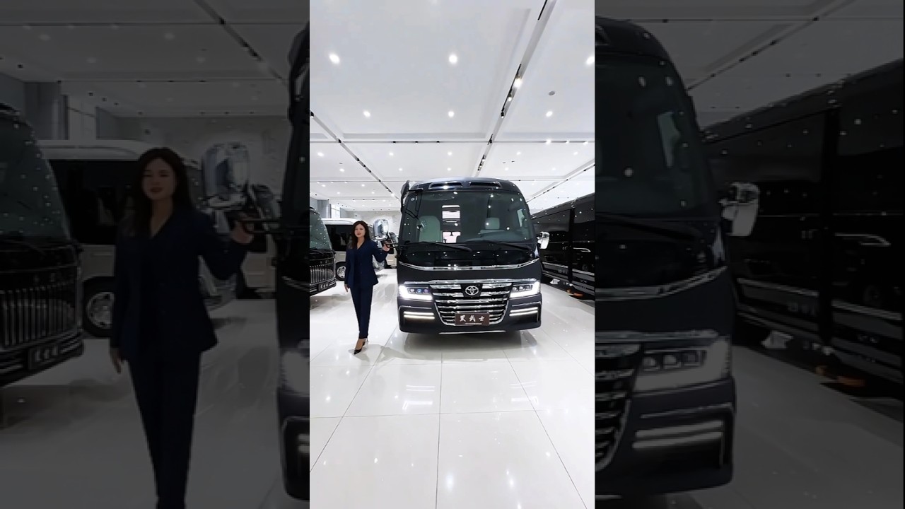 Luxury 12-Seater Toyota Coaster Black Warrior Edition.