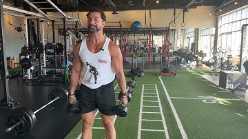 How To Perform A 2 DB Paused Squat Exercise