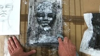 Monoprinting a portrait with black and white oil paint over an acrylic wash.