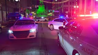 Police investigating after shooting in downtown Indianapolis damages buildings, cars