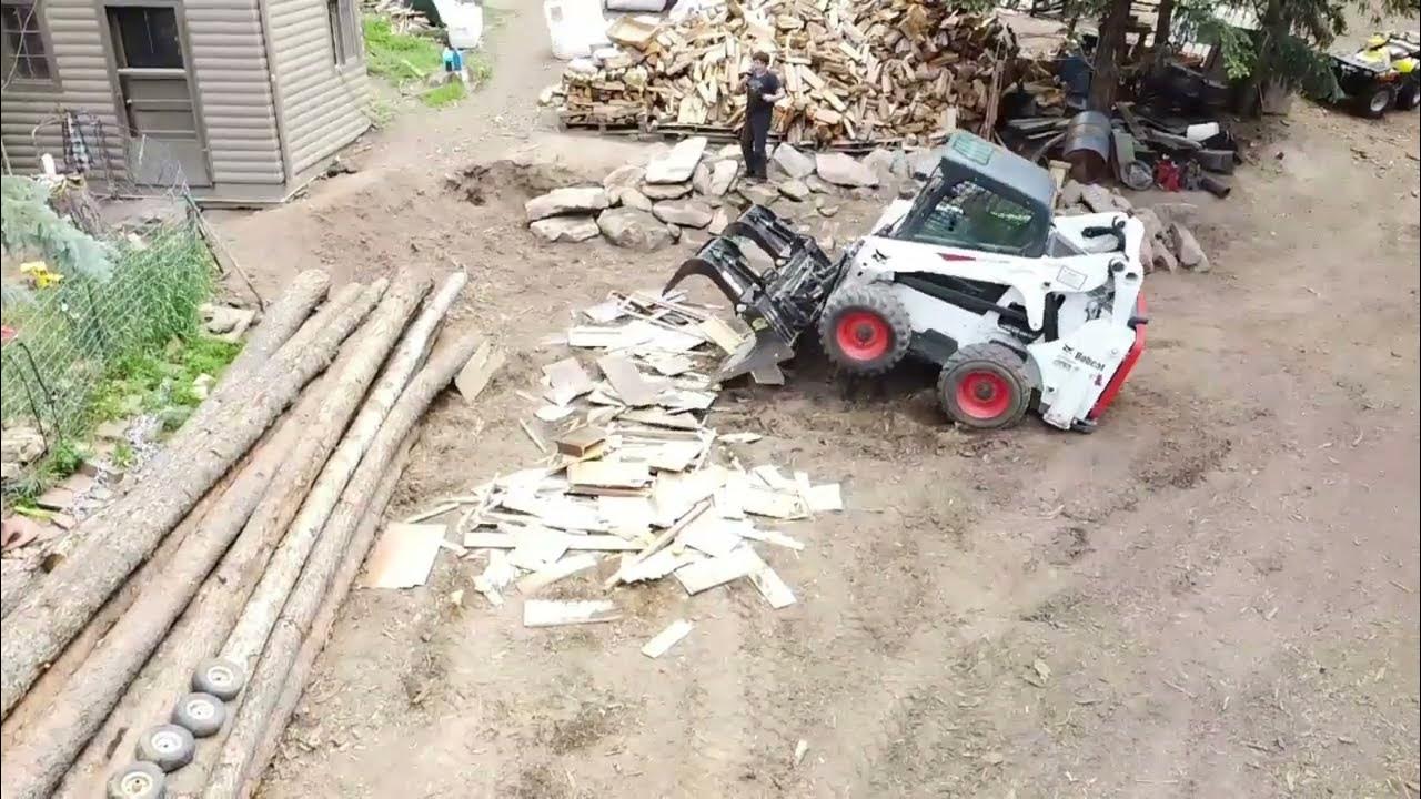 Smashing furniture with a Skid steer Grapple bucket (3 camera angles