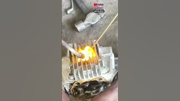 The spark plug in the engine head of the bike is broken.