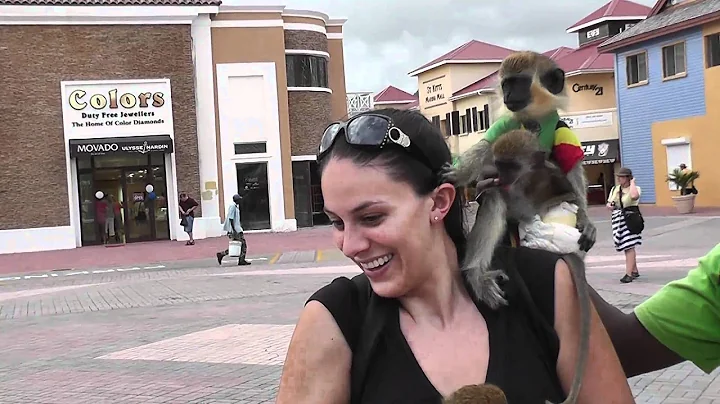 Dena Chulew holding a monkey  in St. Kitts