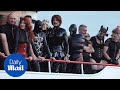 Leatherclad fetishists hold erotic sm party on germanys lake