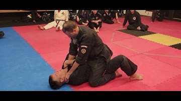Gracie Jiu-Jitsu Trap & Roll Escape from Mount | Jamie Seabrook