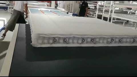 Automatic glue spraying machine in mattress production line