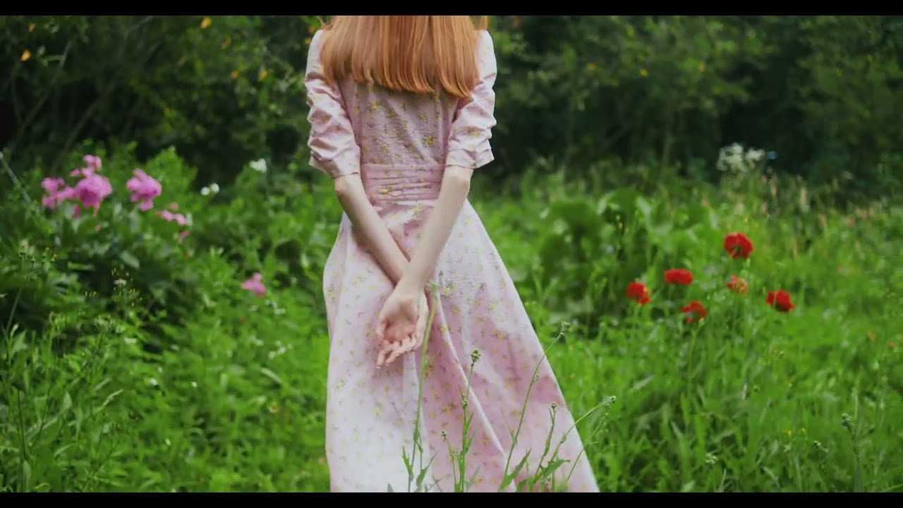 Background, a women walking in garden