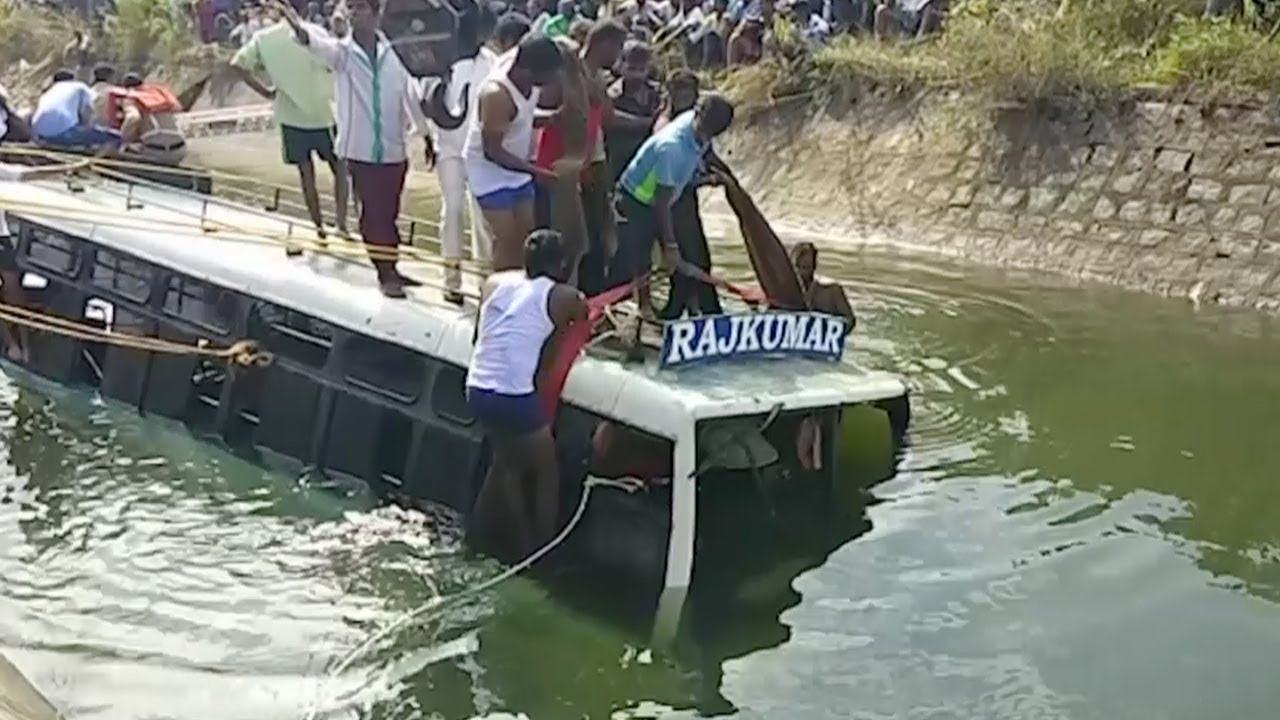 At least 25 dead as bus falls into canal in southern India - YouTube