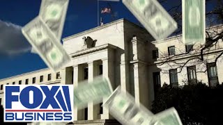 What is the Federal Reserve doing to tame inflation?
