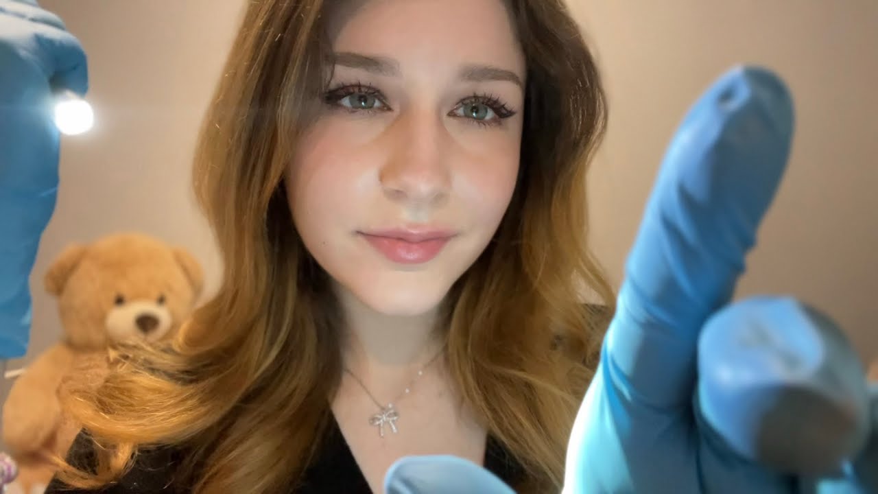 ASMR inspecting your face 🧐 whispering, gloves, flashlight