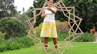 Make a beautiful star shaped Clothes Drying Rack with simple tools and $18 of materials. It expands magically to almost 5 feet tall 
