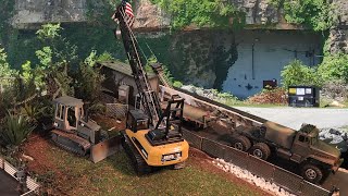 Play Time: Bruder dozer dropped and Huina 40 ton crane wrestles with metal storage container at site