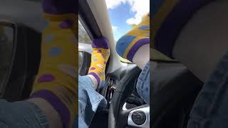 Just Feet In Socks On Dashboard On Break