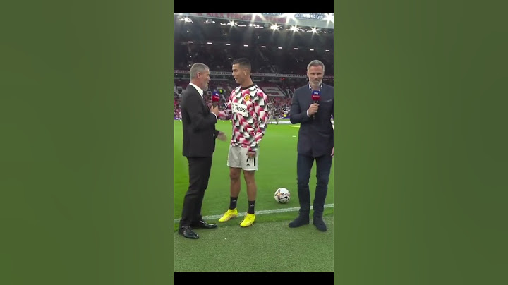 Not starting the match, Ronaldo was still smiling with Roy Keane and Neville