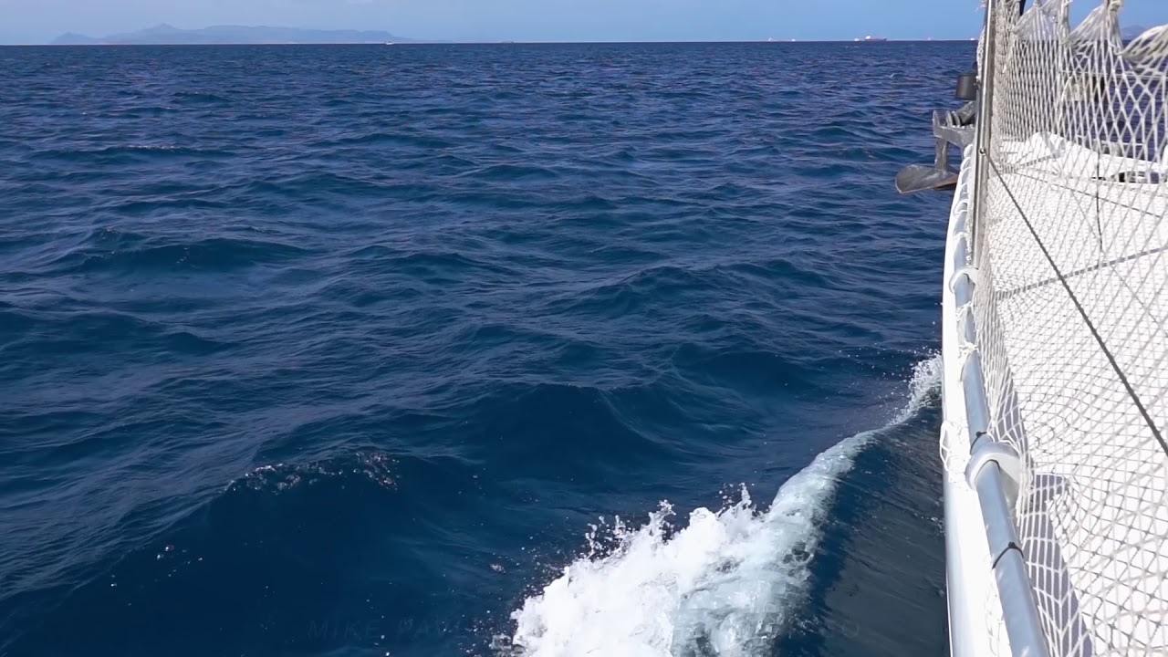 Blue Sea and White Yacht. Slow Motion