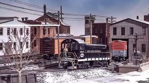 Photographing model rail road scenes by a professional