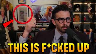 Hasan Piker PROUDLY displays framed 9/11 newspaper showing the Twin Towers IN FLAMES behind him
