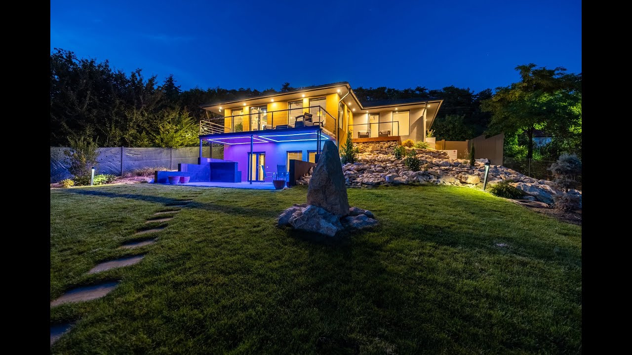 Eladó Budaörsön exkluzív, panorámás családi ház, wellness résszel rendelkező vendégházzal!