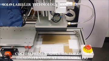 Oil Barrel Labelling Machine | Tamp Top c/w Printer Labelling Machine | Solo Labeller Technology