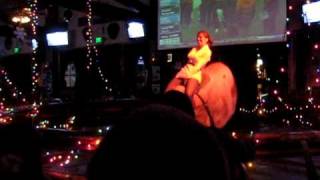 Girl Riding Mechanical Bull Saddle Ranch Bar