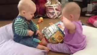 Twins playing together